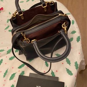 Coach Rogue 25 - blue with rose rivets